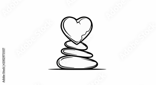 Stacked zen stones with a heart-shaped top stone