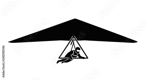 Man flying on hang glider.