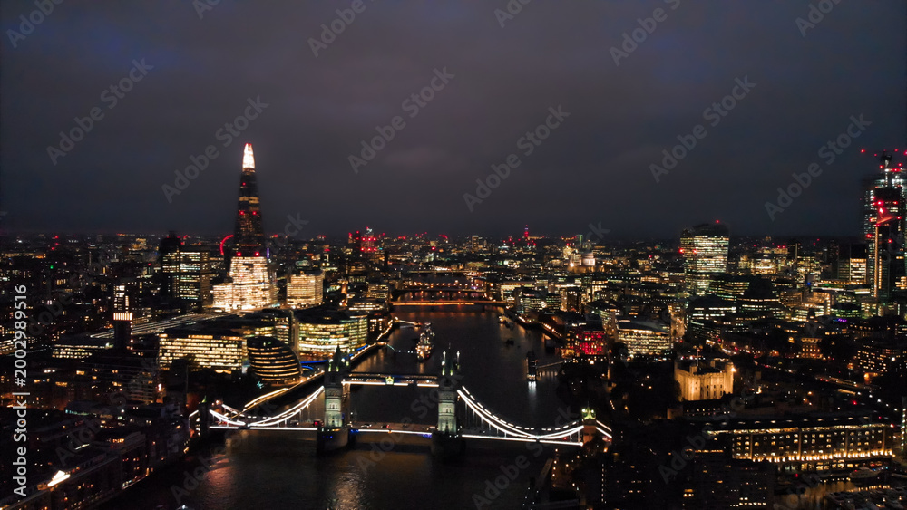 Fototapeta premium London skyline at night with tower bridge and the shard