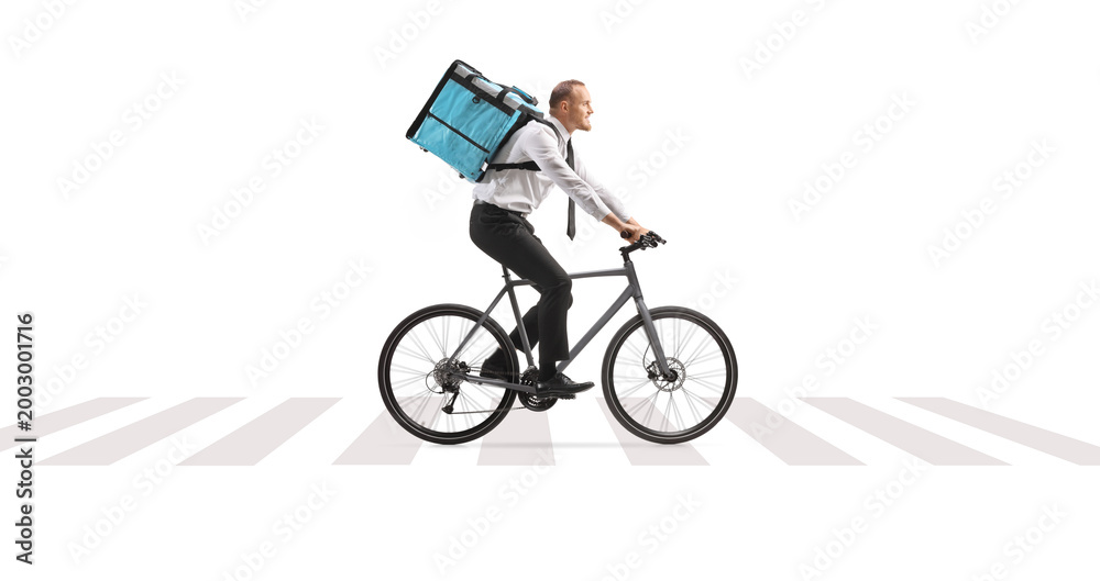 Obraz premium Businessman riding a bicycle and delivering food