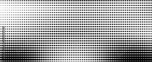 A halftone pattern of small black and white dots creates a gradient effect.