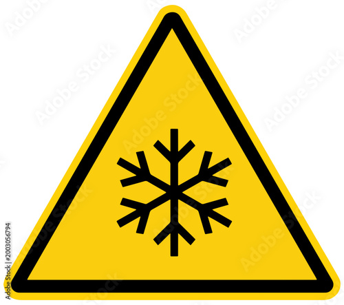 Yellow triangular warning sign with black snowflake symbol