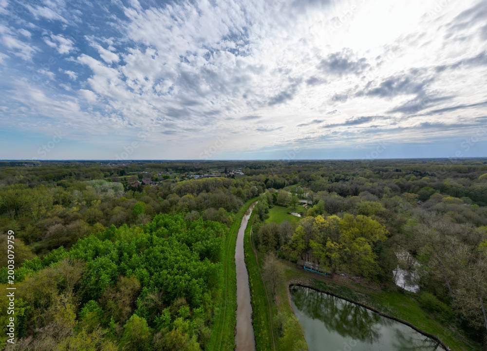 Obraz premium Aerial View of Canal and Green Path in Herselt, Aarschot, Leuven, België - Drone Photography of Rural Belgian Landscape