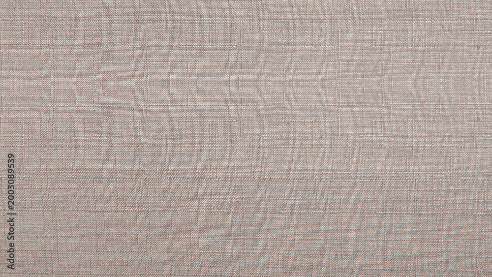 Fototapeta premium Neutral Brown textile background with uniform weave