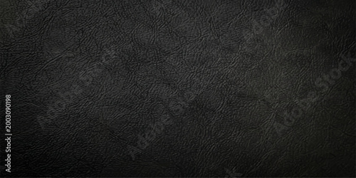 A textured, dark, neutral background provides a versatile canvas for diverse design applications, conveying sophistication and elegance.