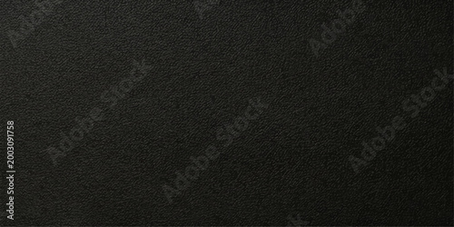 The deep, velvety texture of a plain charcoal canvas, creating a sleek, versatile visual.