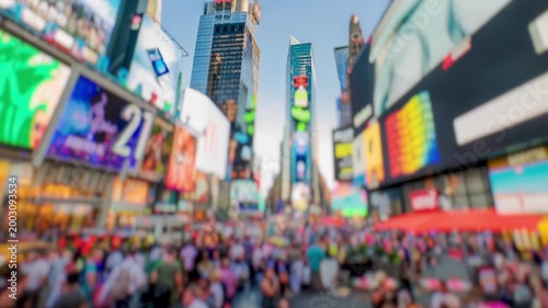 Times Square New York City Daytime Timelapse with Selective Focus. High dynamic range timelapse from raw photo files. Crazy busy people, traffic and LED walls of advertisements. 