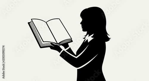 Woman reading a book silhouette.