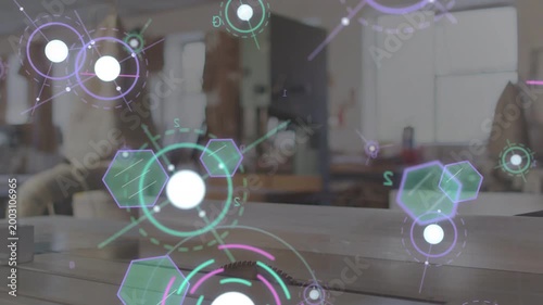 HUD appearing over wooden table, central circle pulsing while hexagons gliding, visualizing data