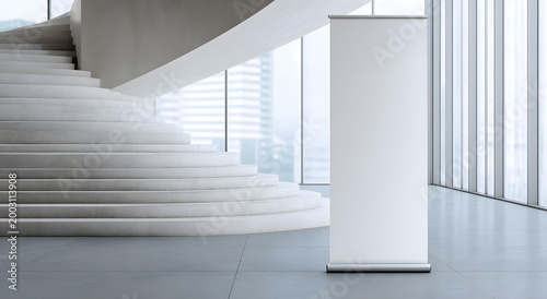 A white roll-up banner template is located next to the stairs in the lobby. An empty advertisement mockup is displayed in a business space. A commercial pull-up display.
