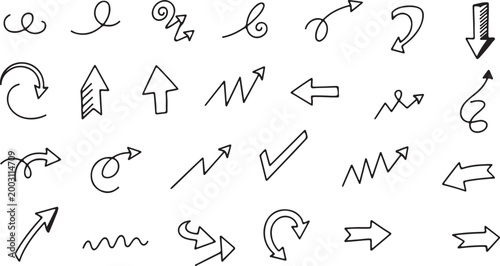 Fotografija Hand drawn sketched arrows and wavy lines in black isolated on white background