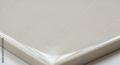 Tableau sur toile Close-up view of a smooth glossy and reflective white surface.