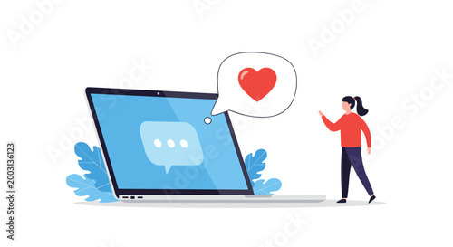Young woman stands next to a large laptop screen displaying a chat bubble and a bright red heart notification.
