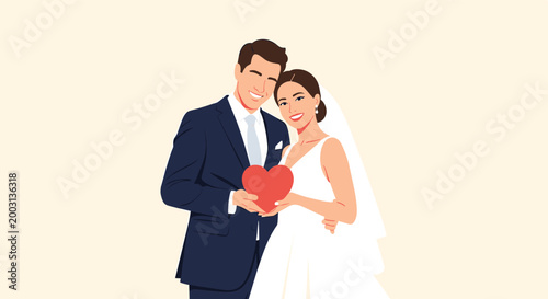 Happy newlywed bride and groom holding a large red heart together, celebrating their wedding day with love and commitment.