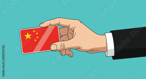 Human hand in a business suit holding a small card featuring the national flag of China against a teal background.