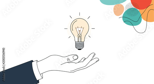 Human hand reaches out towards a glowing light bulb symbolizing a new creative idea or a bright business solution.