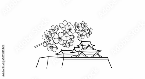 Traditional Japanese castle with blooming cherry blossoms above