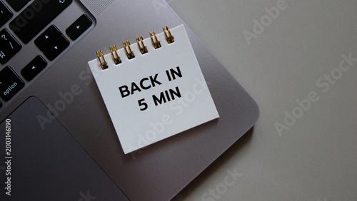 Back in 5 min written on a memo at the office.