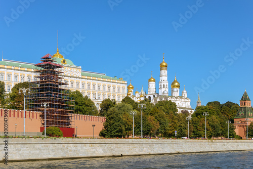 Grand Kremlin Palace and Uspensky Sobor (Assumption Cathedral) on the Kremlin Embankment of Moscow river.