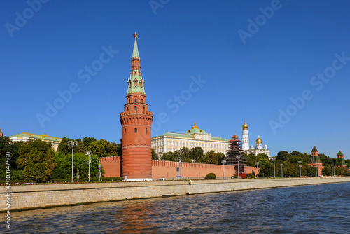 The Vodovzvodnaya Tower and the Grand Kremlin Palace on the Kremlin Embankment of Moscow river.