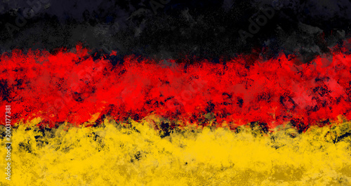 Abstract grunge background with German flag colors and painted texture