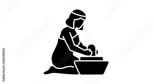 Woman kneading dough by hand.