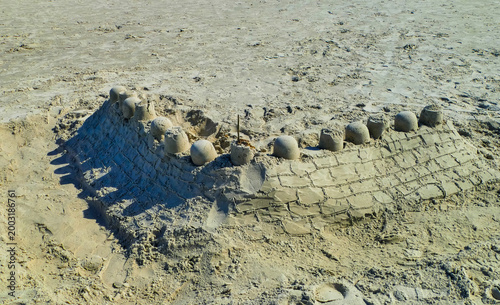 Sandburg an Strand