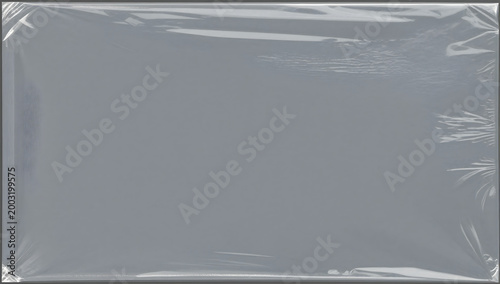 Packaging Impression: An elegant close-up reveals the minimalist beauty of a transparent cellophane wrapper, artfully encircling an object. The lighting casts subtle shadows.