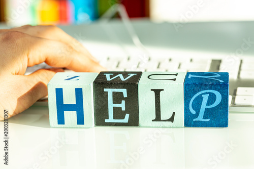 A hand typing on a keyboard...