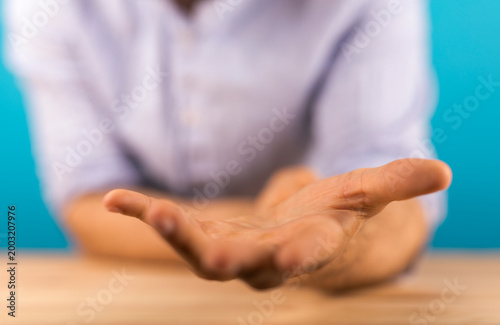 Person extending an open ha...