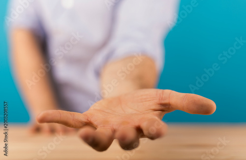 Close-up of hand reaching o...