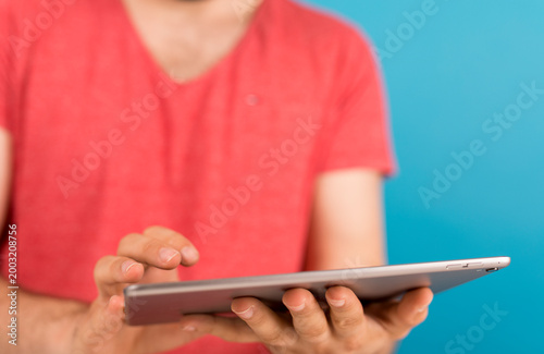 Close-up of a man using a t...