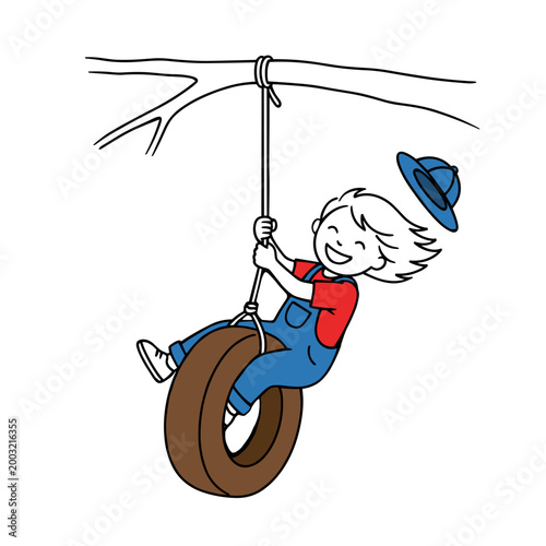 Happy child swinging on a tire swing in a tree outdoors  
