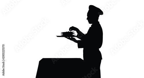 Professional chef silhouette working in kitchen while holding a tray of plates for restaurant service