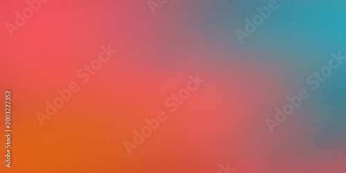Abstract grainy gradient background with red orange and teal