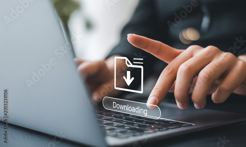 Person downloading file on laptop with download icon and progress bar