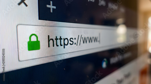 Plakat w ramie Macro Close-Up of HTTPS URL Address Bar with Green Padlock Security Icon on Browser Screen
