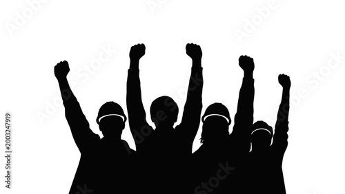 Silhouette of four people with fists raised in protest