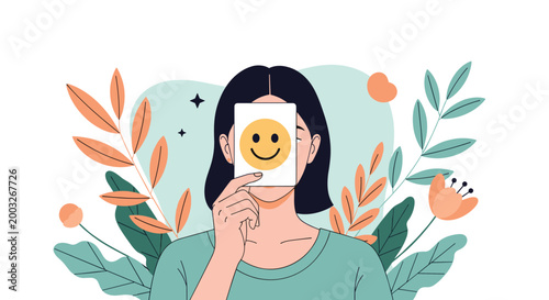 Woman holding a simple smiley face card over her real expression to illustrate the pressure of faking happiness in social settings.