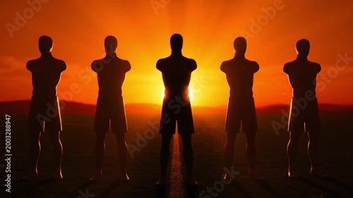 Silhouette of Five Strong Men Standing in a Row Against a Vibrant Orange Sunset, Representing Unity, Power, and Teamwork