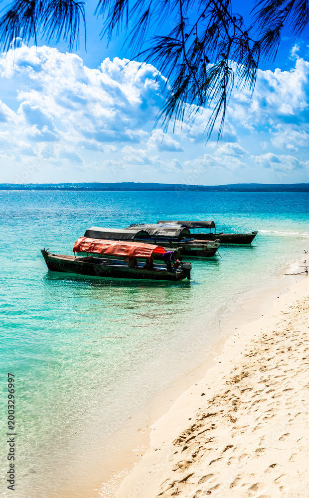 Fototapeta premium Fishing Boat Anchored On Ocean Shore