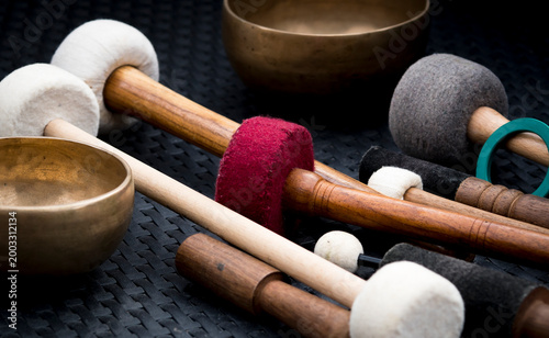 Singing bowls and wooden mallets