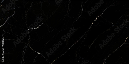 High end black marble texture with dramatic silver and bronze veining, polished natural stone surface offering a bold and luxurious aesthetic for modern interiors