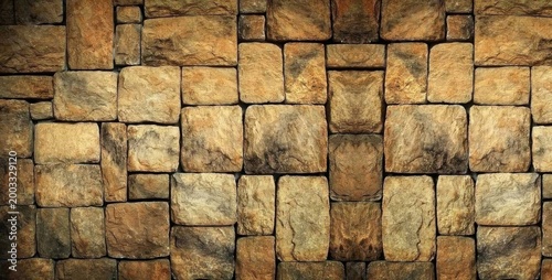 A close-up view of a weathered stone wall made of bricks.