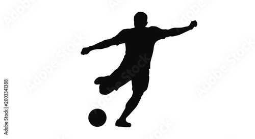 Soccer player silhouette kicking ball against white background
