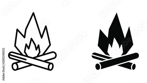 Campfire with flames burning on wooden logs