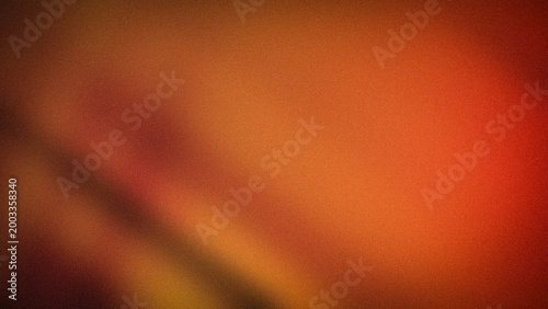 Warm abstract 4K grainy gradient with orange red and brown aesthetic backdrop