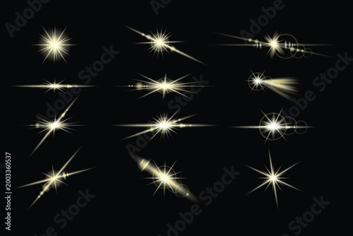 Collection of golden light sparkles on black background