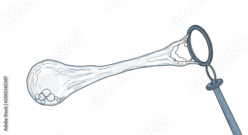 Large elongated soap bubble being blown from a circular wand showing iridescent reflections and small droplets in the air.