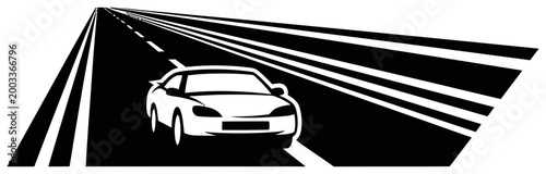 White sports car speeding down a dark road with headlights shining brightly ahead quickly